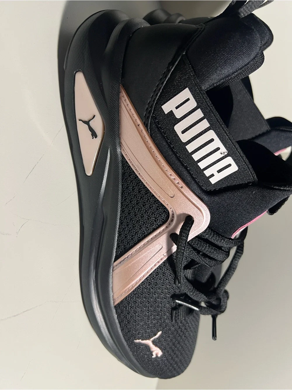 Puma Women's Black with Rose Gold Accent Athletic Sneakers